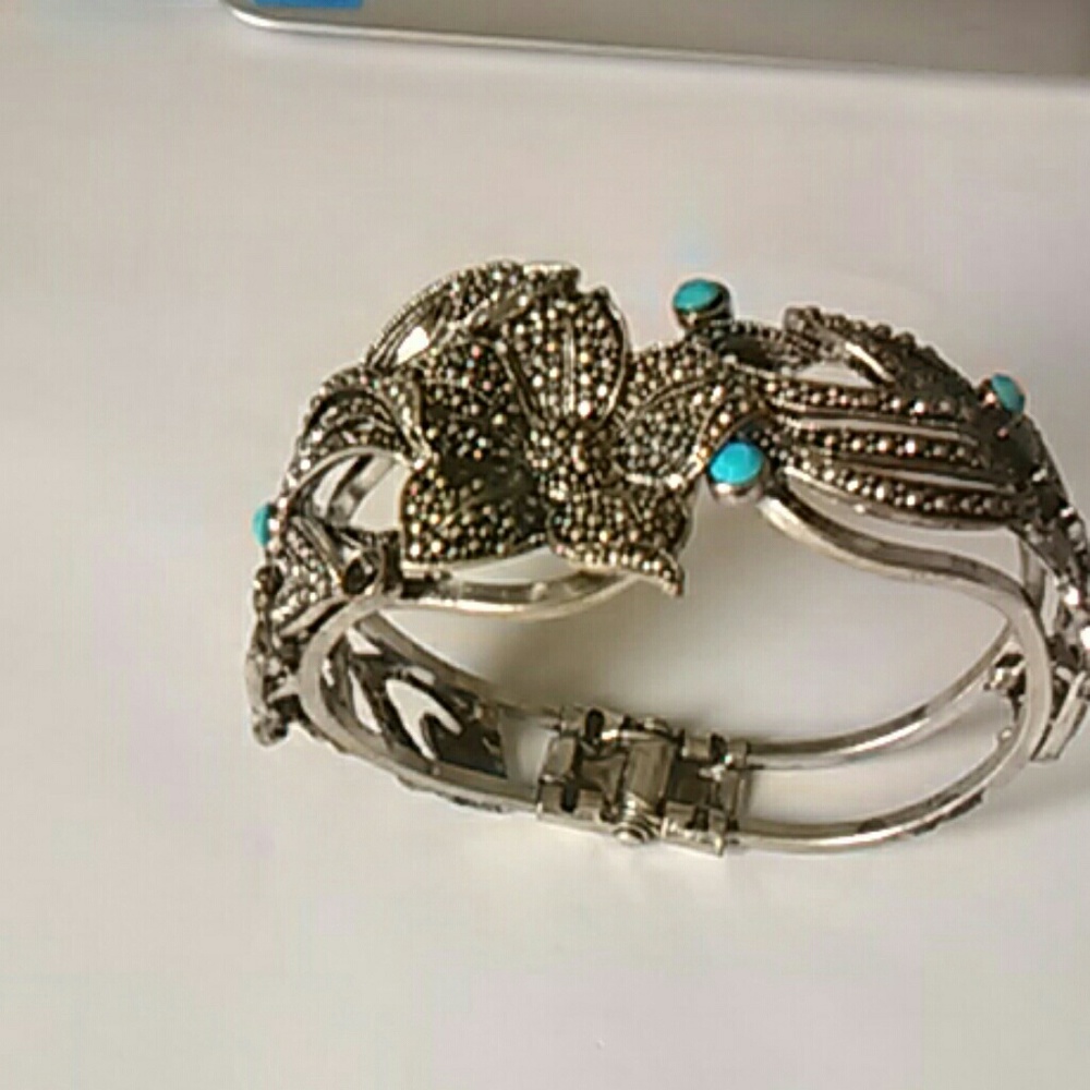 Silver Bracelet with jade stones.